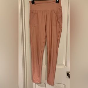 New, never worn S/M Peach leggings w/ wide tummy band, pockets.